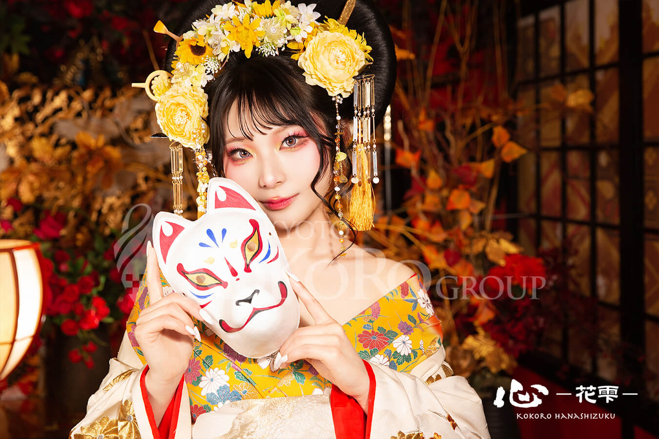 黄色の季節限定簪を着用した華やかな花魁姿